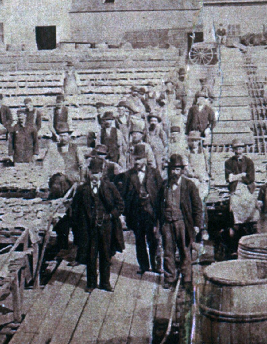 men in front of Shute & Merchant